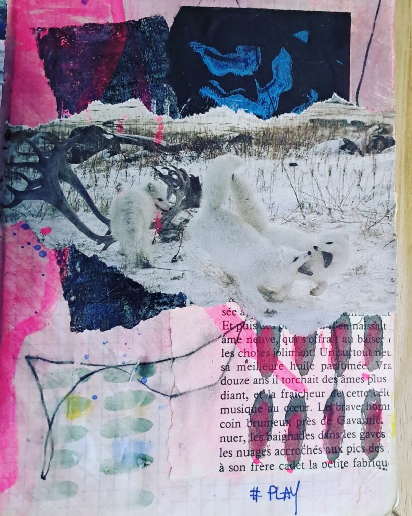 Mixed media journal page in shades of white, blue, and pink.