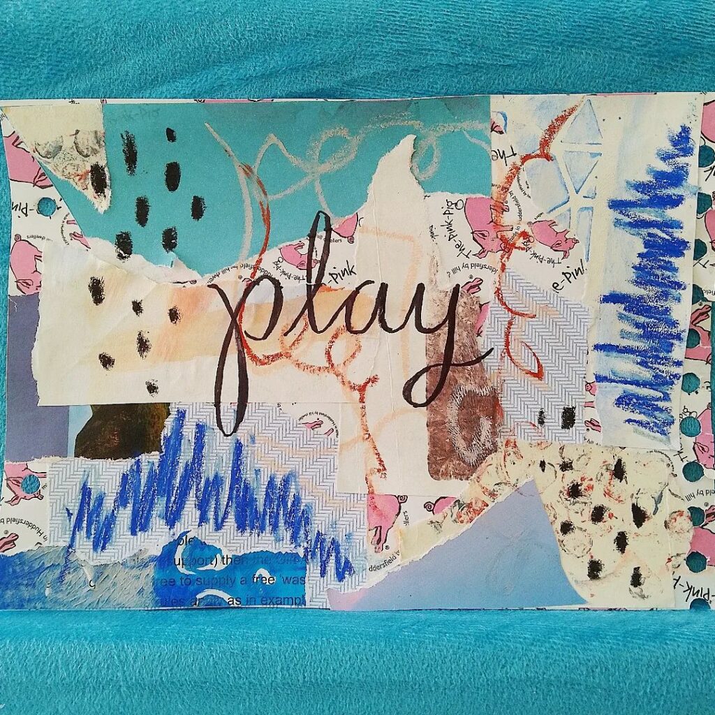 A mixed media piece with elements of collage, blue accents, and the word PLAY written in cursive in the middle.